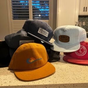 Lot of 7 EUC Binky Bro snap backs (infant size)